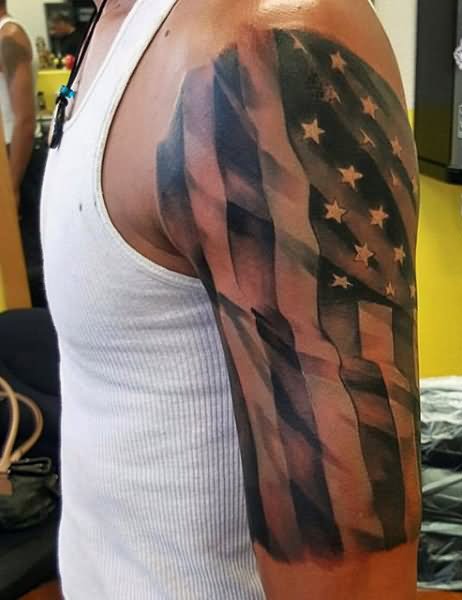 Black And Grey Military Flag Tattoo On Left Half Sleeve