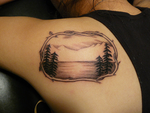Black And Grey Scenery In Frame Tattoo On Left Back Shoulder