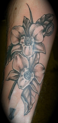 Black And White Orchid Flowers Tattoos Design
