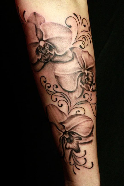 Black And White Orchid Tattoo On Arm