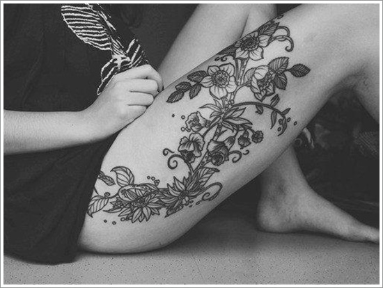 Black And White Orchid Tattoo On Girl Right Thigh