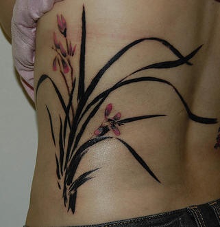 Black And White Orchid Tattoo On Side Rib