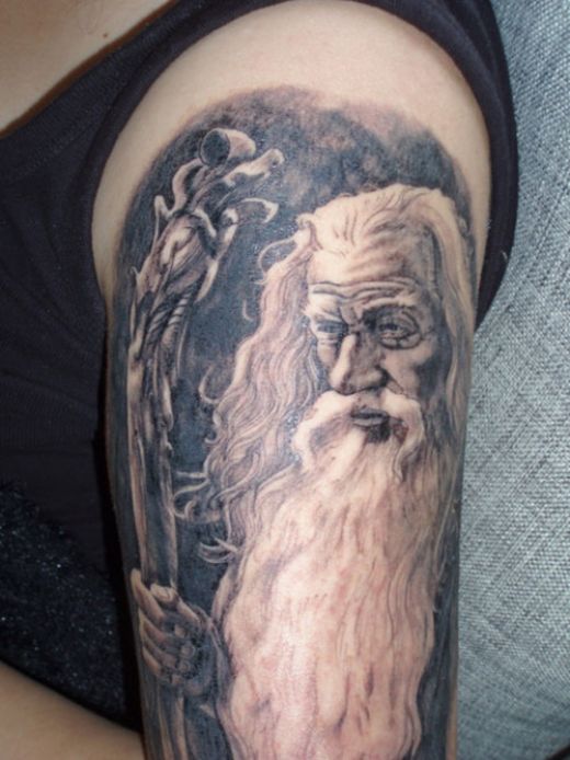 Black And White Wizard Tattoo On Left Half Sleeve