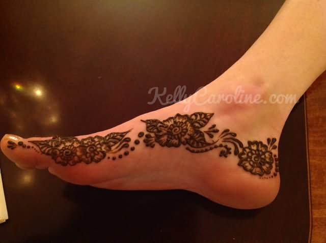 Black Henna Flowers Tattoo On Foot