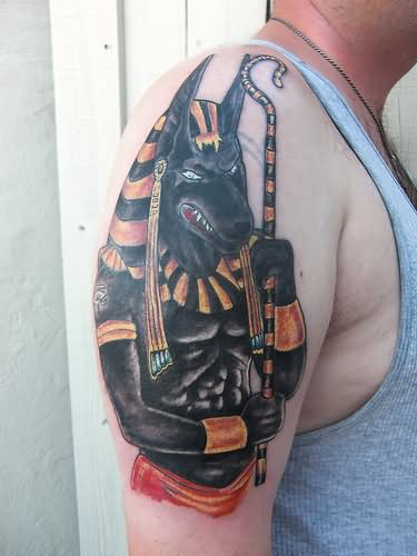 Black Ink Anubis Tattoo On Right Shoulder