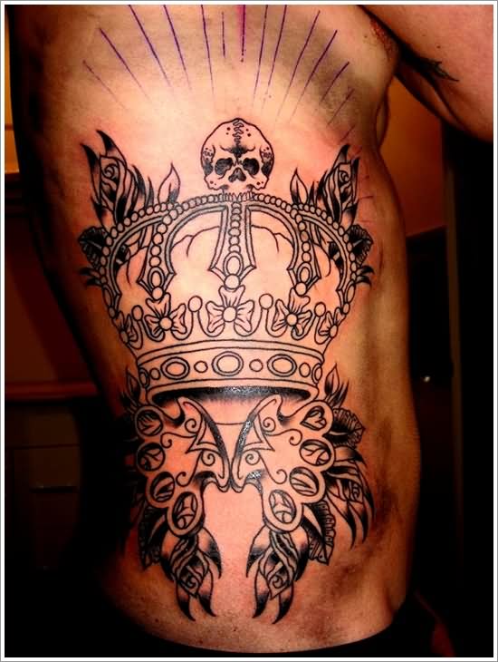 Black Ink King Crown Tattoo On Man Side Rib