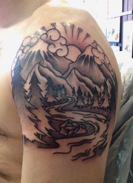 Black Ink Traditional Mountain Scenery Tattoo On Man Left Shoulder