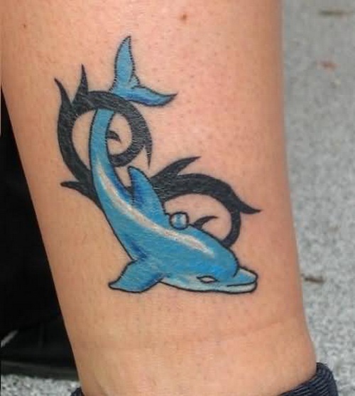 Black Tribal And Blue Dolphin Tattoo On Leg