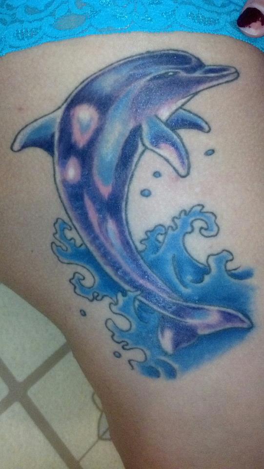 Blue Ink Side Rib Dolphin Tattoo