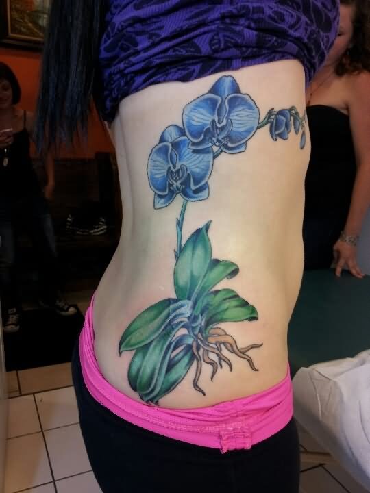 Blue Orchid Tattoo On Girl Rib Side