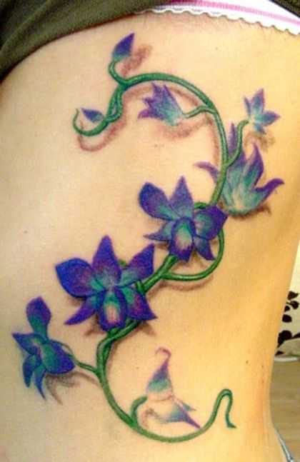 Blue Orchid Tattoos On Girl Side Rib