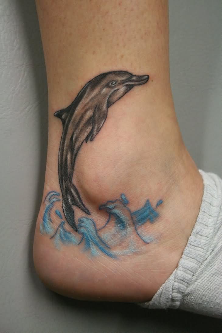 Blue Water Splash And Dolphin Tattoo On Right Ankle