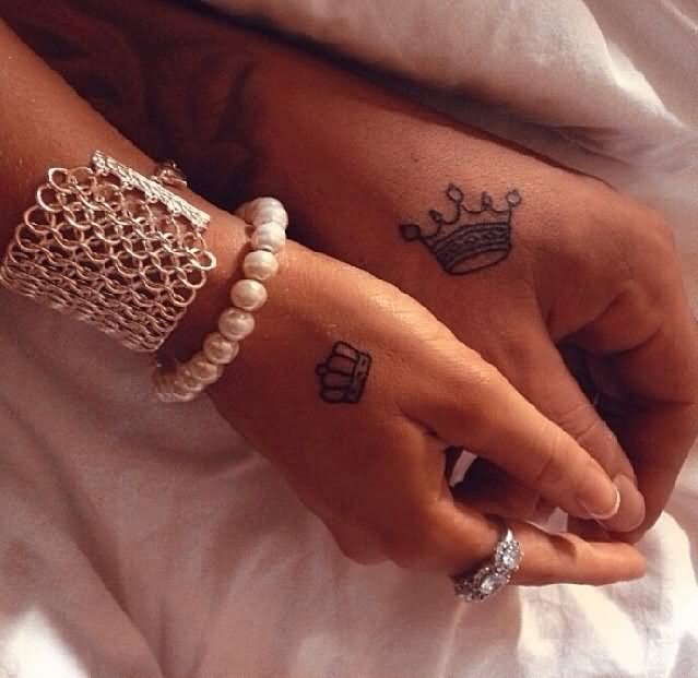 Classic Black Outline King And Queen Crown Tattoo On Couple Hand
