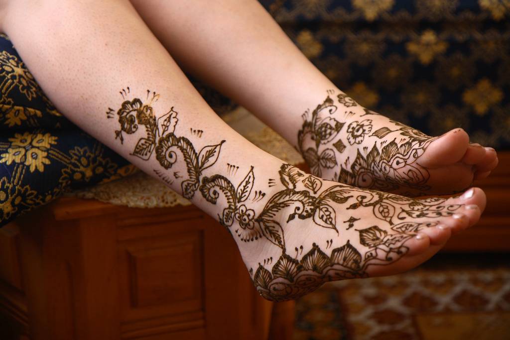 Classic Henna Flower Tattoo On Feet