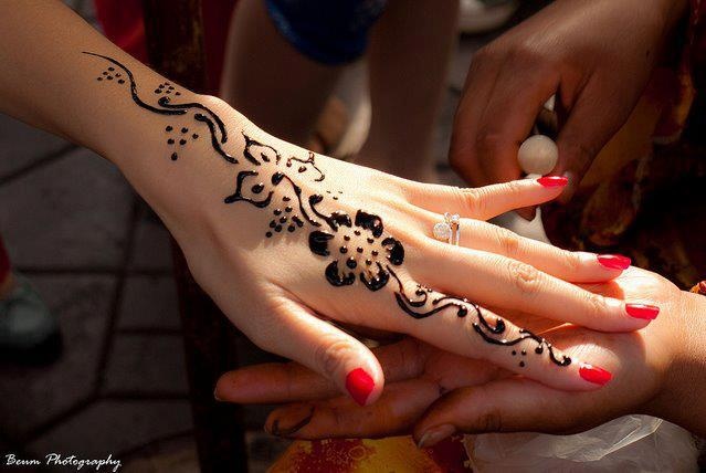 Classic Henna Flower Tattoo On Girl Left Hand