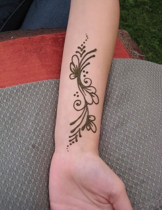 Classic Henna Flowers Tattoo On Wrist By Meghan Mehndi