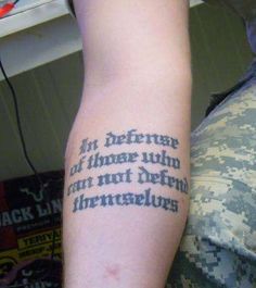 Classic Military Quotes Tattoo On Forearm