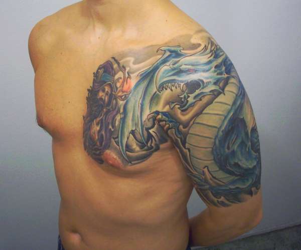 Colored Dragon And Wizard Tattoo On Front Shoulder