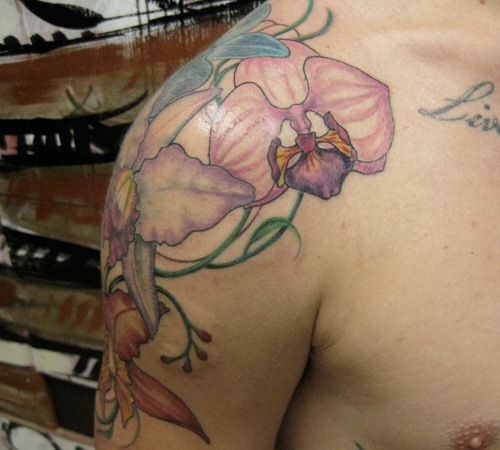 Colored Orchid Tattoo On Shoulder For Men