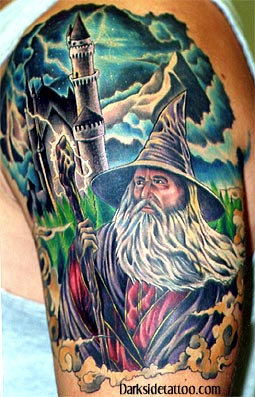 Colored Wizard And Castle Tattoo On Left Half Sleeve