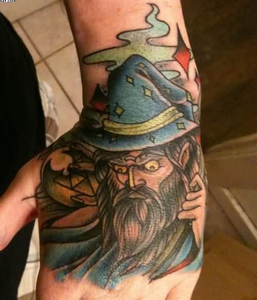 Colored Wizard Tattoo On Left Hand