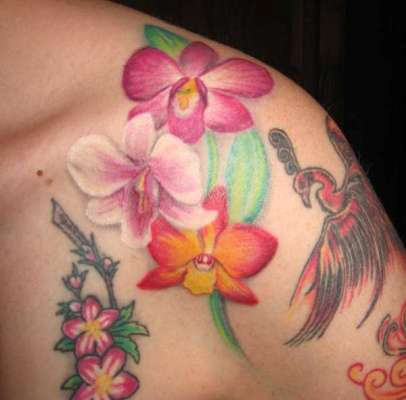 Colorful Orchid Tattoos On Left Shoulder