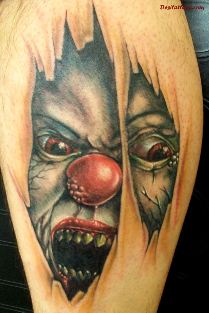 Colorful Torn Ripped Skin Clown Face Tattoo Design For Leg