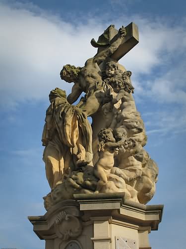 Crucifix Statue At The Charles Bridge, Prague