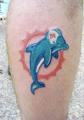 Dolphin Tattoo On Back Leg
