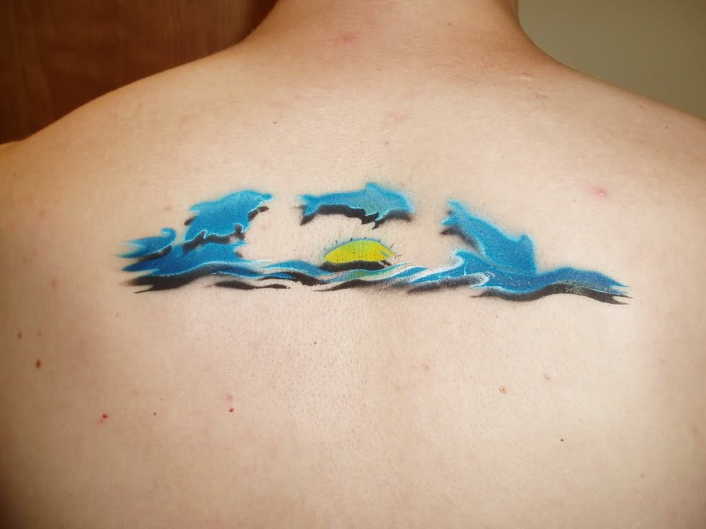 Dolphin Tattoos On Upper Back by Commandera
