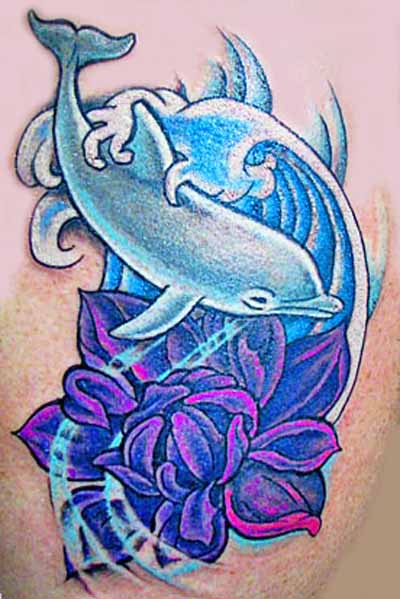 Flower And Dolphin Tattoo On Side Rib