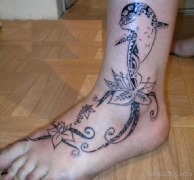 Flowers And Dolphin Tattoo On Ankle