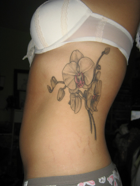 Girl Rib Side Black And White Orchid Tattoo