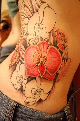 Girl Side Rib Orchid Flower Tattoo