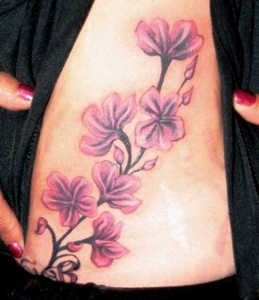 Girl Side Rib Orchid Flowers Tattoo