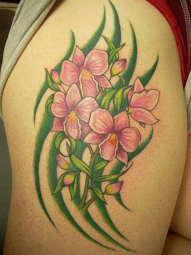 Green Tribal And Orchid Tattoo On Side Thigh