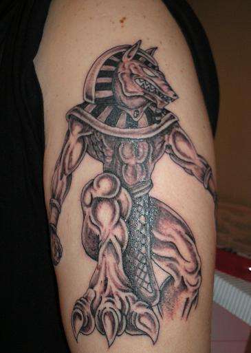 Grey Ink Anubis Tattoo On Half Sleeve