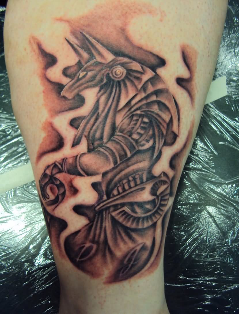 Grey Ink Anubis Tattoo On Leg by Crowcnil