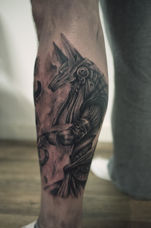 Grey Ink Anubis Tattoo On Leg