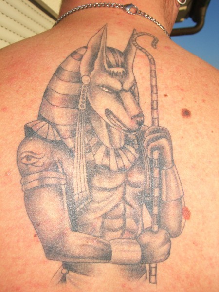 Grey Ink Anubis Tattoo On Man Back Body