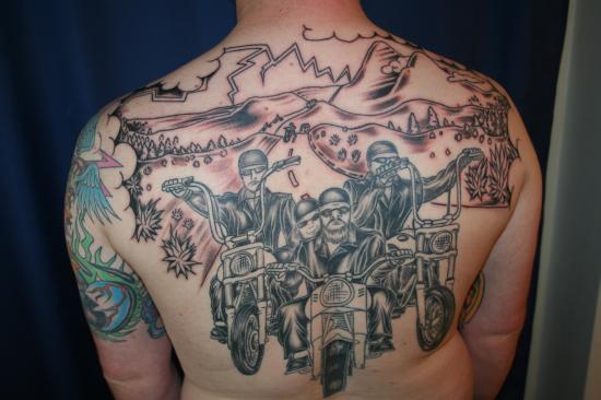 Grey Ink Bikers Scenery Tattoo On Man Upper Back
