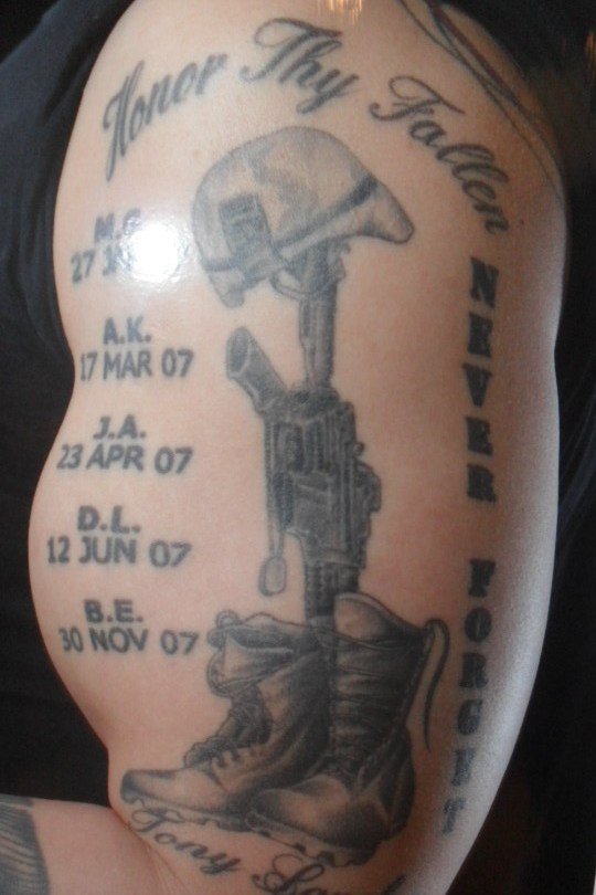 Grey Ink Memorial Military Boots Rifle Helmet Tattoo On Man Left Half Sleeve