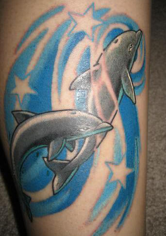 Grey Ink Stars And Blue Dolphin Tattoo On Half Sleeve