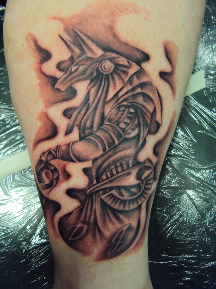 Grey Ink Traditional Anubis Tattoo On Leg by Crowcnil