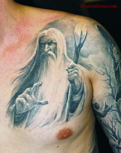 Grey Ink Wizard Tattoo On Front Shoulder