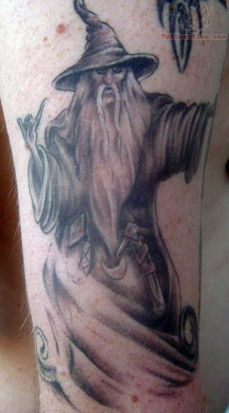 Grey Ink Wizard Tattoo On Half Sleeve