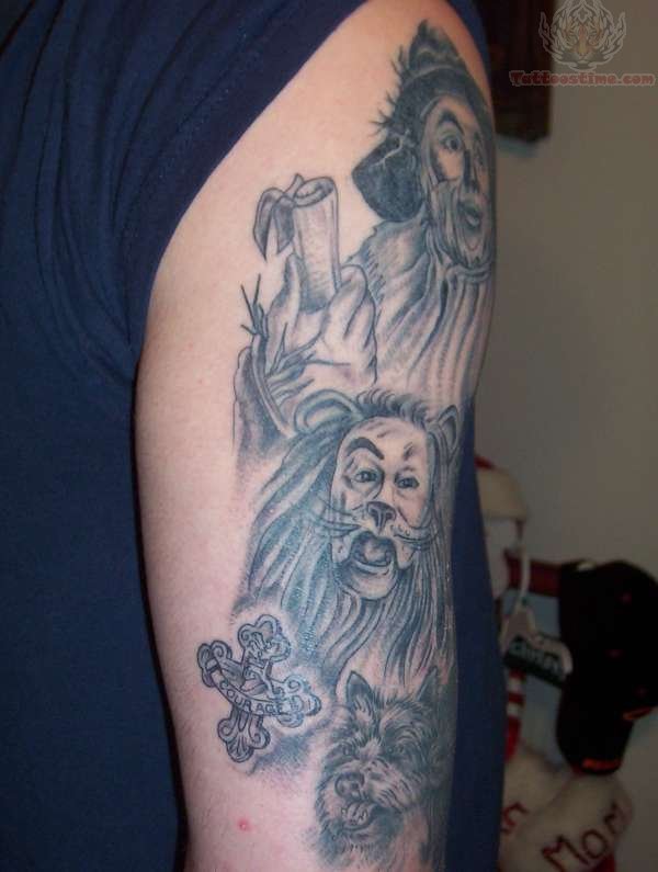 Grey Ink Wizard Tattoo On Left Bicep