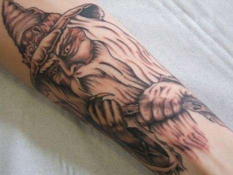 Grey Ink Wizard Tattoo On Leg
