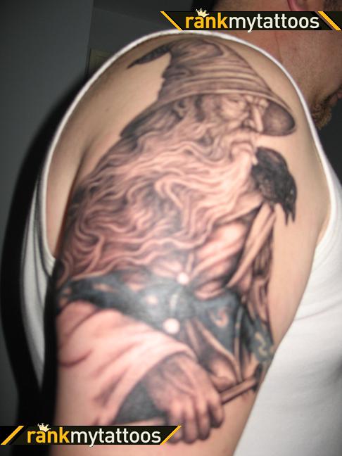 Grey Ink Wizard Tattoo On Right Shoulder