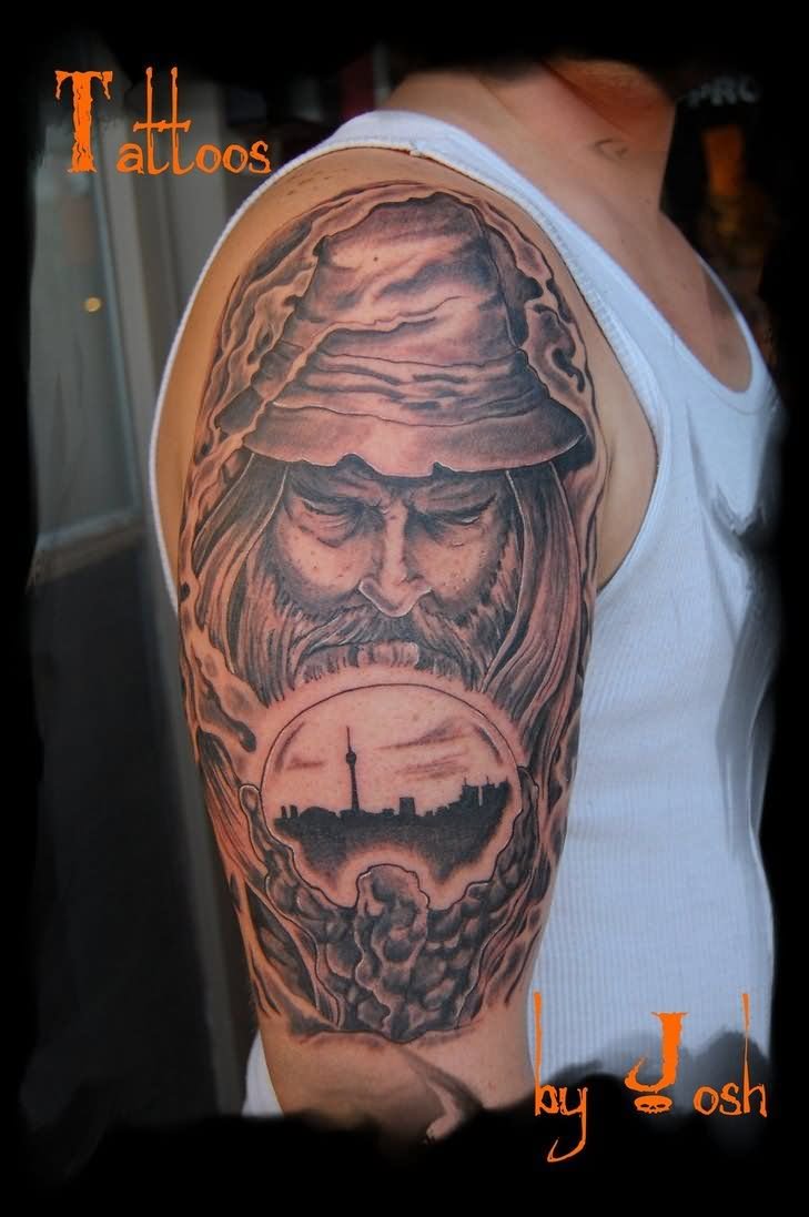 Grey Ink Wizard With Crystal Ball Tattoo On Half Sleeve